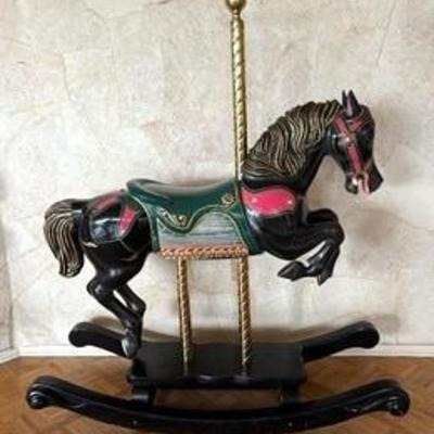 Amazing Carousal Rocking Horse. Lovely painted wooden horse with wooden pole. Probably by S & S Woodcarvers, CA. 

Your childhood dream...