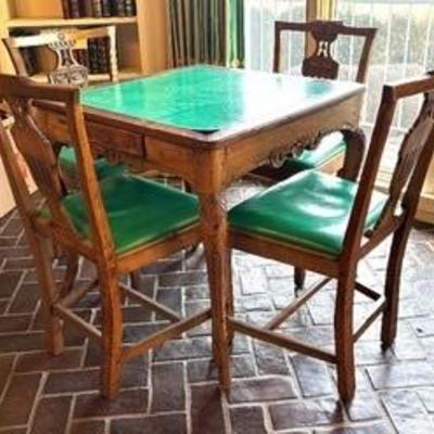 Antique Regence Game Table with Four Antique Neoclassical Accent Chairs. Crafted in solid-stock wood, later leather top, Regence design,...