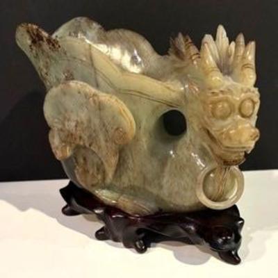 Vintage Carved Hard Stone Dragon Sculpture

Semi-transparent with russet inclusions; dragon head with ring neck and vessel body; internal...