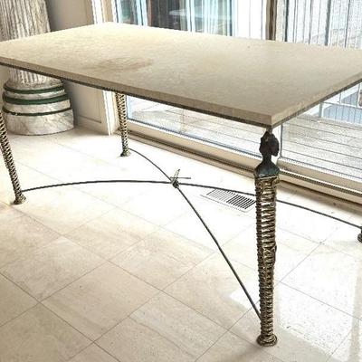 Nefertiti Table by Mario Villa 

Custom made table by Mario Villa. Patinated wrought steel and brass table with hard stone top, caryatid...
