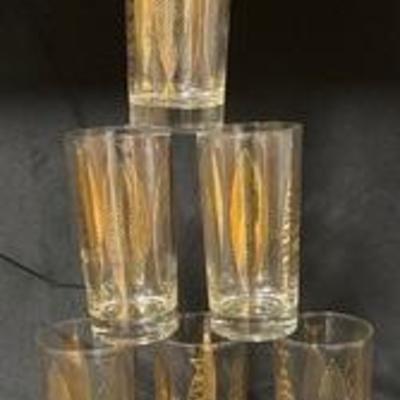 Vintage Gold Gilded Fish and Wave Glassware by Fred Press.

They measure 5.5 inches tall.