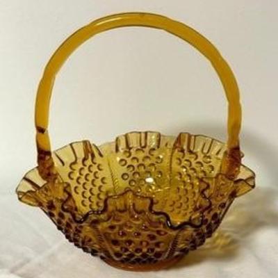 Fenton Amber Glass Colonial Hobnail Ruffled Basket Bowl

Measures 8 inches tall. Simply stunning! 