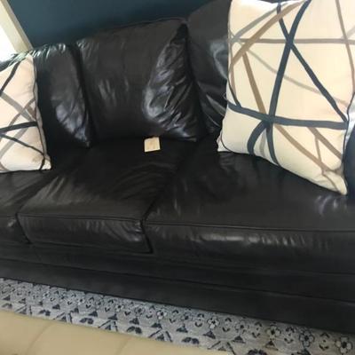 Vanguard brown leather queen sleeper sofa $990
78 X 37 X 32