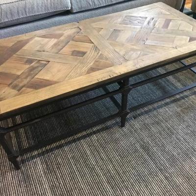 wood and metal coffee table $550
54 X 26 X 18