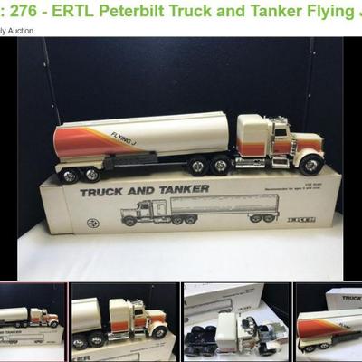 Lot # : 276 - ERTL Peterbilt Truck and Tanker Flying J
Die Cast metal replica of Peterbilt Truck and Tanker sponsored by Flying J...