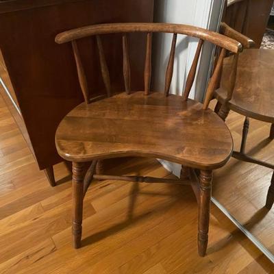 Kidney shaped wood chair in great condition.