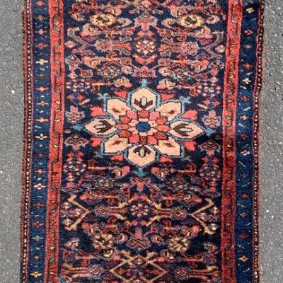 26 x 51 in.  The next 3 rugs are clean but are being sold as-is with moth damage.