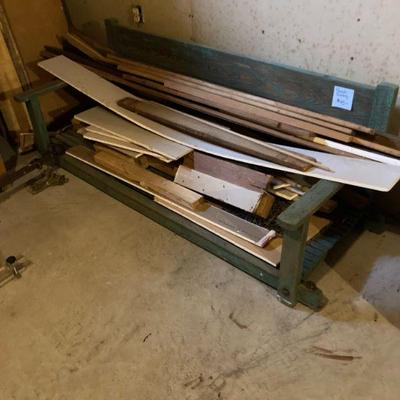 Under this pile of lumber is a very nice porch swing