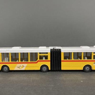 Lot 107 | Die Post Articulated Yellow Bus Model Siku