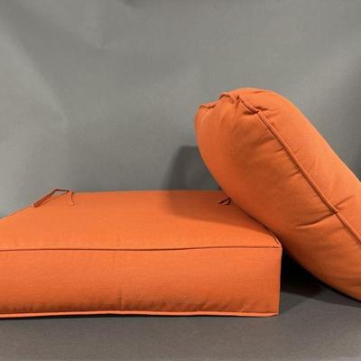Lot 201 | Two Large Orange Patio Cushions.
