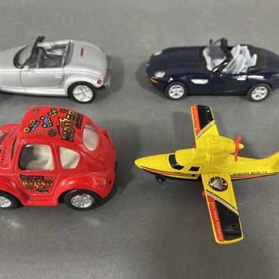 Lot 114 | Toy Car Models BMW & Plymouth and Plane