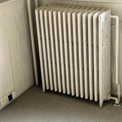 over 20 cast iron radiators of all sizes
