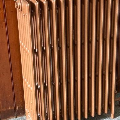 over 20 cast iron radiators of all sizes