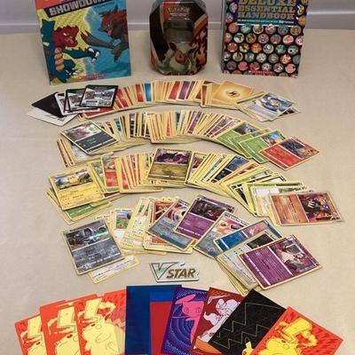 MMF069 Over 330 Pokémon Trading Cards In Collectible Tin & Two Pokémon Books

