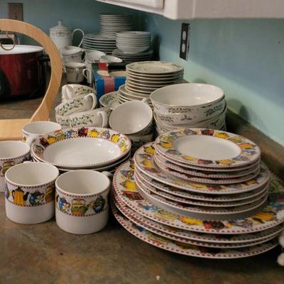 Several sets of dishes and serving ware