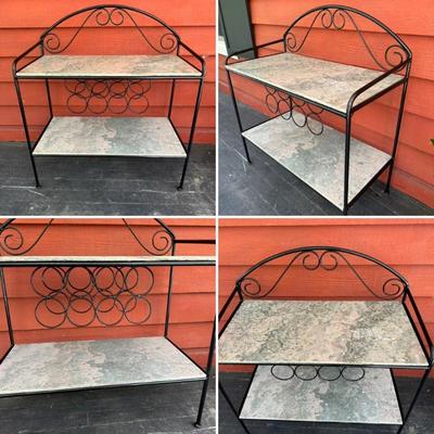 Vintage black metal frame and marble shelf bar. Classic and elegant. Originally produced for Pier 1, this handsome piece features two...
