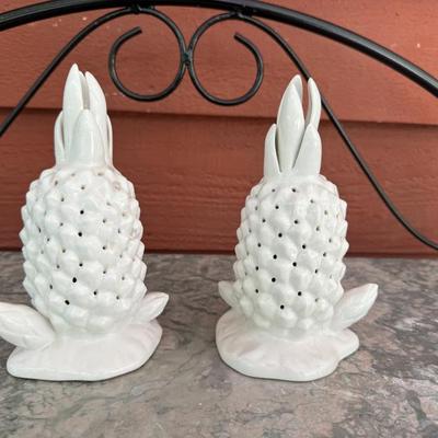 Rare white ceramic pineapple shaped hors doeuvre service. Marked “E”. Measures approximately 7 1/4” tall and 4” wide.