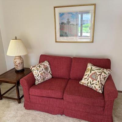 Love seat, 2 pillows, side table, lamp, picture