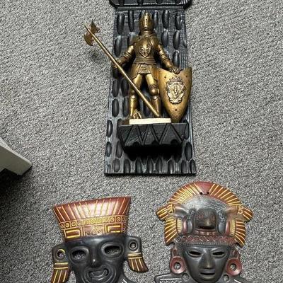 Wall hangings:  2 authentic Mexican clay heads; 3D knight relief