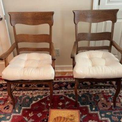 Two Wooden Chairs And A Small Foot Stool