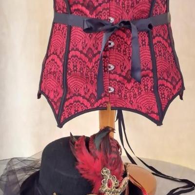 Get Your Steampunk On With This Adore Me Red & Black Corset And Enbellished Hat