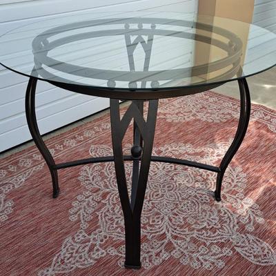 Glass Top Metal Table 40 Inches In Diameter