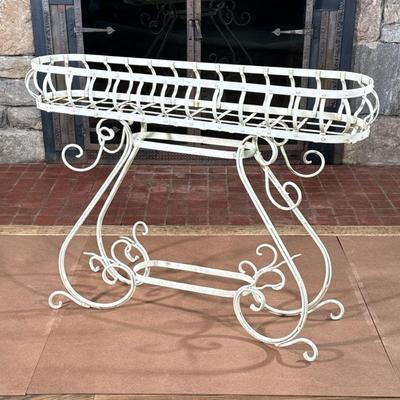 VINTAGE WIRE FRAME PLANT STAND | Oval elongated top fits various planters or a liner, over a scrollwork frame base. - l. 51 x w. 13 x h....