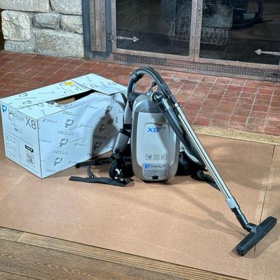 PROLUX X8 BACKPACK VACUUM | Original box, additional attachments and accessories plus bags.

