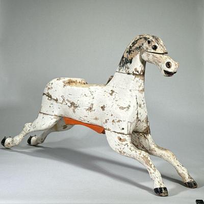 ANTIQUE CARVED HORSE FIGURE | Steeple Chase horse. Has carved horse shoes, and stands on its own. Period details. Likely from a child's...