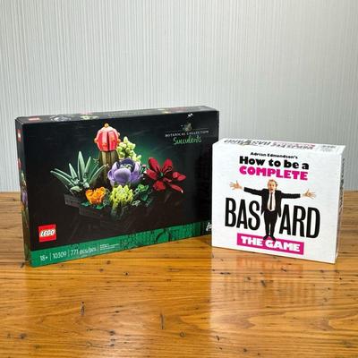 (2PC) GAMES & LEGOS | Includes: New in box Lego Succulents, and Adrian Edmondson’s How to be a Complete Bastard The Game.

