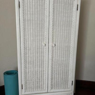 WHITE PAINTED WICKER CABINET | Having double doors over a single drawer with a domed top.

