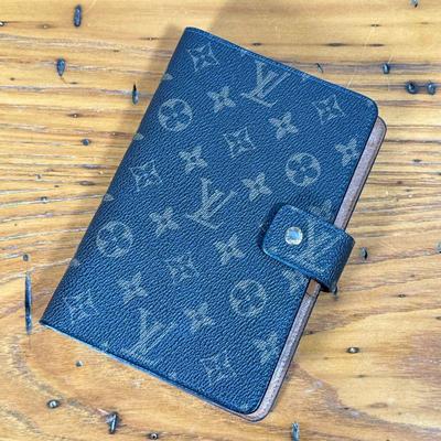 VINTAGE LOUIS VUITTON LEATHER ADDRESS BOOK | Louis Vuitton address book in LV print leather case, c. 2000. - l. 7.5 x w. 5 in

