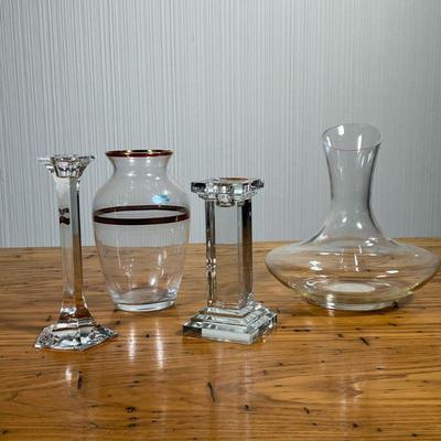 MIXED GLASS LOT | Including: two candlesticks, large cylindrical ribbed vase, small vase with gilt accents, and glass decanter. - h. 11 x...