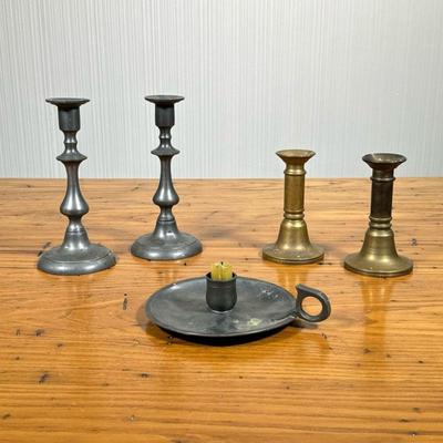 (5PC) BRASS & PEWTER CANDLESTICKS | Includes pair of pewter candlesticks stamped “England”, pair of brass candlesticks, and pewter...