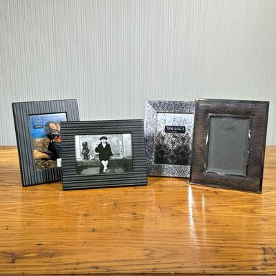 (4PC) ASSORTED PICTURE FRAMES | Mixed lot of 5x7 picture frames including 1 pair of frames and leather bordered frame. - l. 10.25 x w....