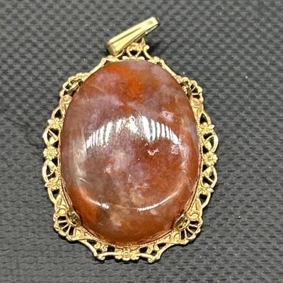 12kt Gold Pendant w/ Red Stone