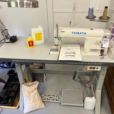 Yamata Sewing Machine and table with misc. sewing items