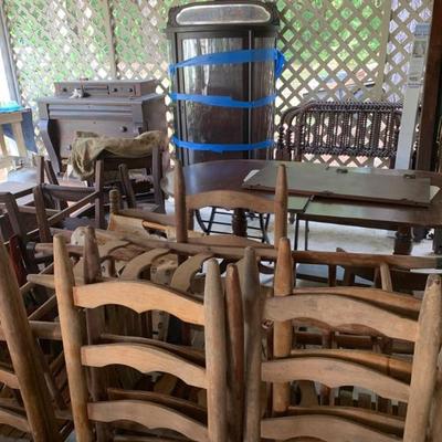 China cabinet with wooden shelves, chairs