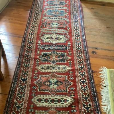 $325- hand-knotted rug 135" x 34" 