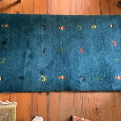 $125-rug matches the smaller one 62" x 36"