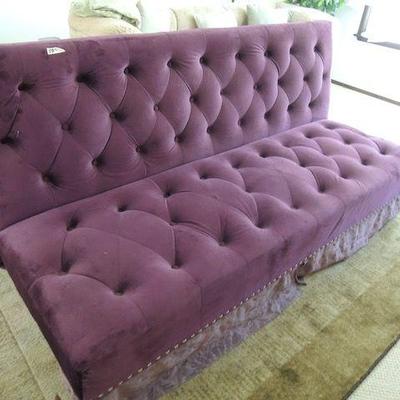 Purple velvet sofabed
