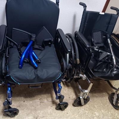 Two wheelchairs of more senior and ambulatory care items.