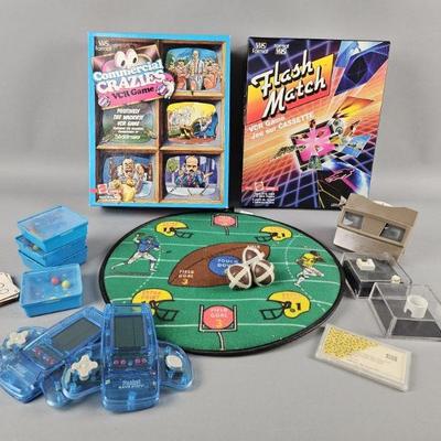 Lot 140 | Vintage VHS Games, Brain Teasers & More!