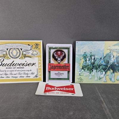 Lot 354 | Beer and Liquor Tin Ads
