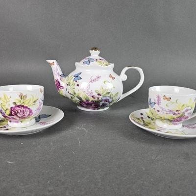 Lot 28 | Teapot with Matching Cups & Saucers