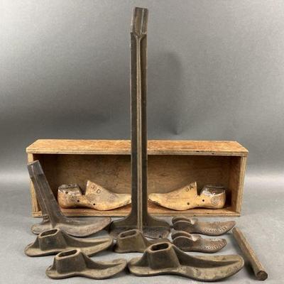 Lot 347 | Cast Iron Cobblers Stand, Shoe Forms & More
