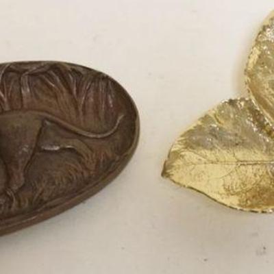 1160	BRASS METAL CRAFTERS LEAF DISH AND BRONZE OVAL DISH WITH IMAGE OF LION, APPROXIMATELY 5 IN X 9 IN
