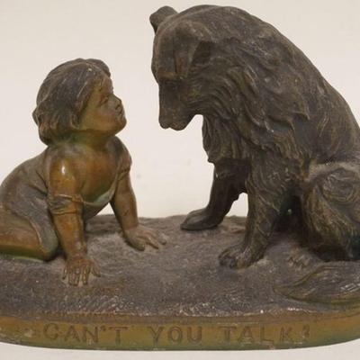 1154	ANTIQUE CAST METAL STATUE, CHILD WITH A DOG, OVER THE CAPTION *CAN'T YOU TALK*, APPROXIMATELY 8 IN X 4 IN X 6 IN H

