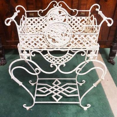 1231	ORNATE 2 PART CAST AND WROUGHT METAL PLANTER ON STAND, APPROXIMATELY 28 IN X 12 IN X 35 IN H

