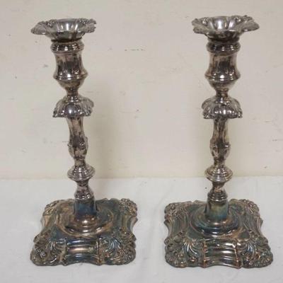 1167	PAIR OF ORNATE SILVER PLATE CANDLESTICKS, APPROXIMATELY 11 IN H
